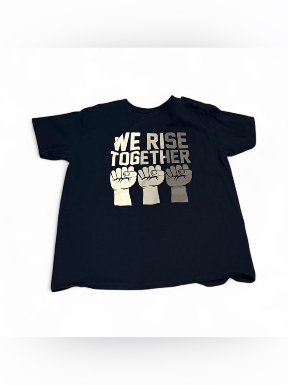 Spencer's Black Tee with "We Rise Together" Graphic